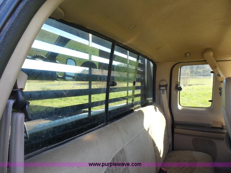 image for item BG9084 2000 Ford F250 Super Duty SuperCab flatbed pickup truck