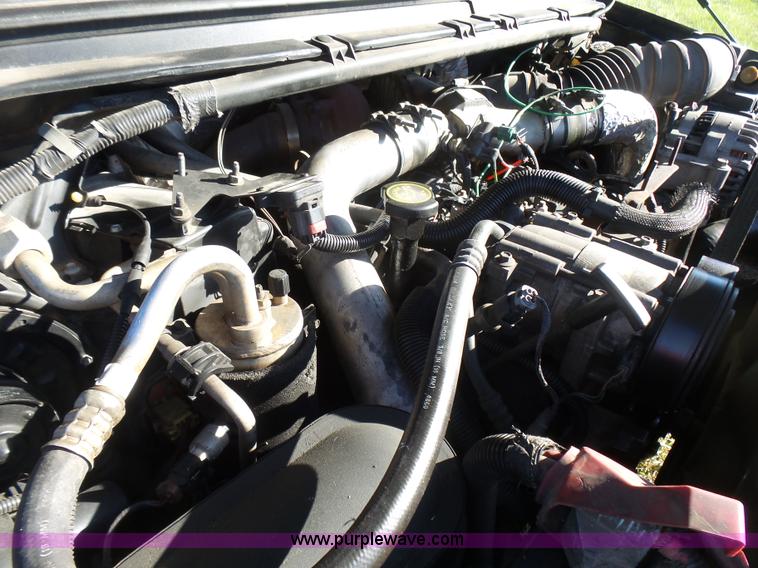 image for item BG9084 2000 Ford F250 Super Duty SuperCab flatbed pickup truck