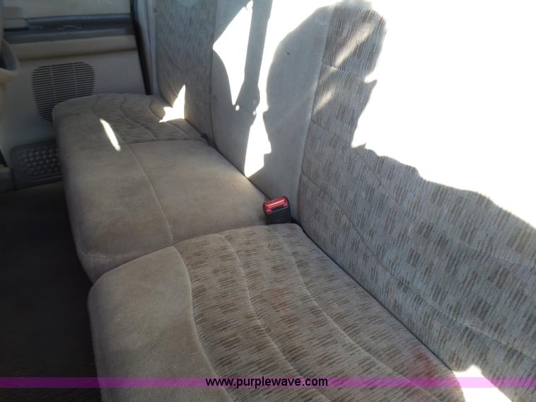 image for item BG9084 2000 Ford F250 Super Duty SuperCab flatbed pickup truck