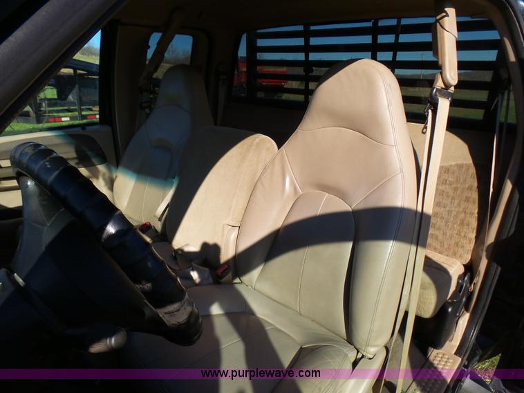 image for item BG9084 2000 Ford F250 Super Duty SuperCab flatbed pickup truck