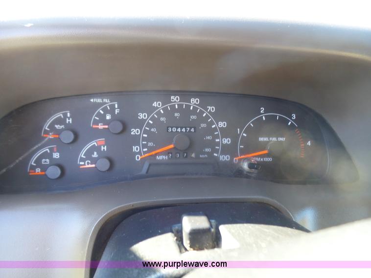 image for item BG9084 2000 Ford F250 Super Duty SuperCab flatbed pickup truck