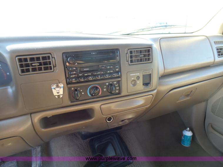 image for item BG9084 2000 Ford F250 Super Duty SuperCab flatbed pickup truck