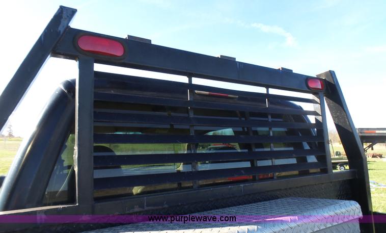 image for item BG9084 2000 Ford F250 Super Duty SuperCab flatbed pickup truck