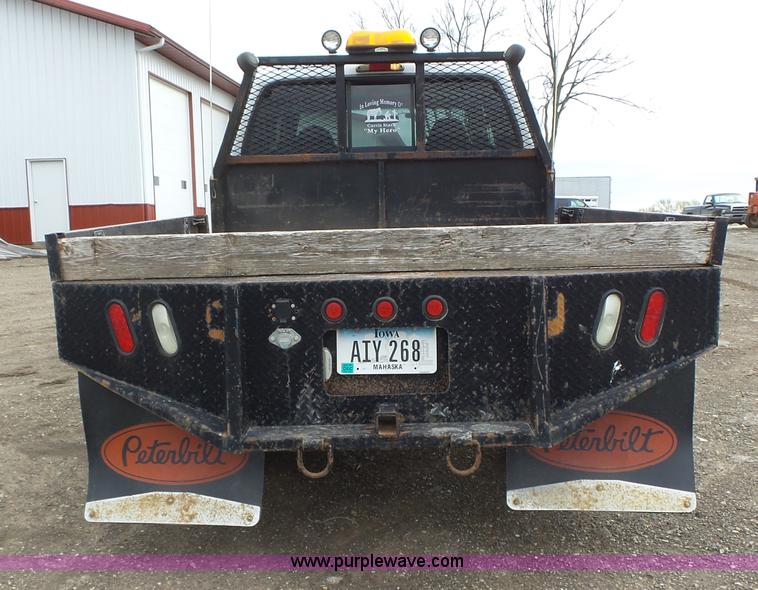 image for item L5690 1999 Ford F250 Super Duty XL Crew Cab flatbed pickup truck