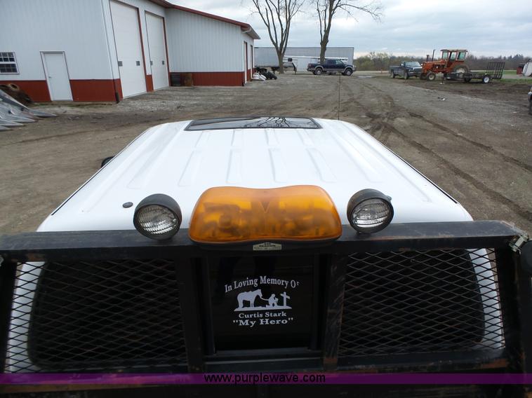 image for item L5690 1999 Ford F250 Super Duty XL Crew Cab flatbed pickup truck