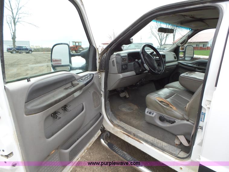 image for item L5690 1999 Ford F250 Super Duty XL Crew Cab flatbed pickup truck