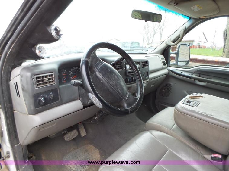 image for item L5690 1999 Ford F250 Super Duty XL Crew Cab flatbed pickup truck