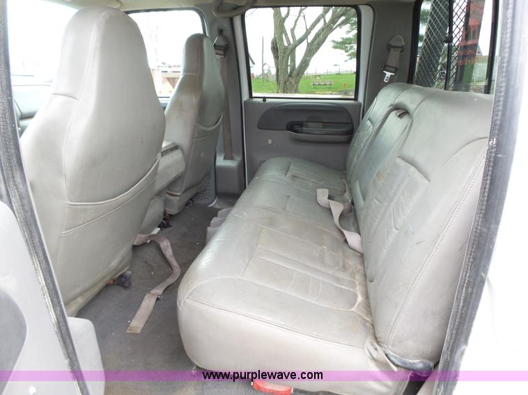 image for item L5690 1999 Ford F250 Super Duty XL Crew Cab flatbed pickup truck