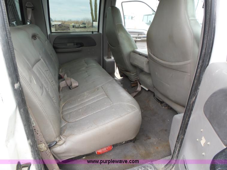 image for item L5690 1999 Ford F250 Super Duty XL Crew Cab flatbed pickup truck