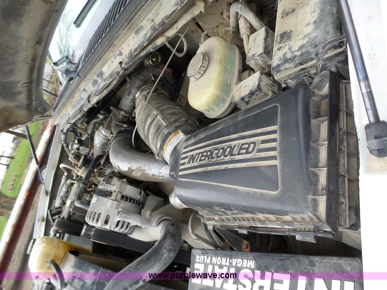 image for item L5690 1999 Ford F250 Super Duty XL Crew Cab flatbed pickup truck