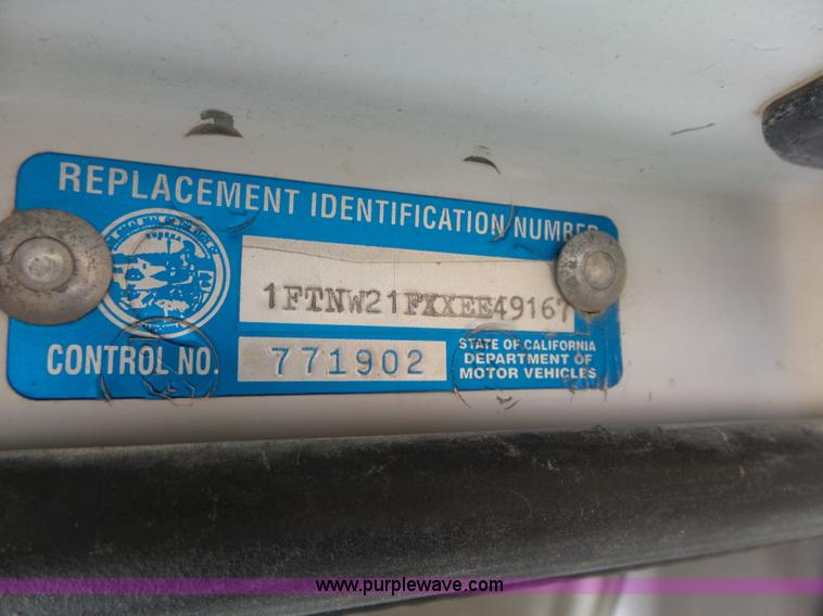 image for item L5690 1999 Ford F250 Super Duty XL Crew Cab flatbed pickup truck