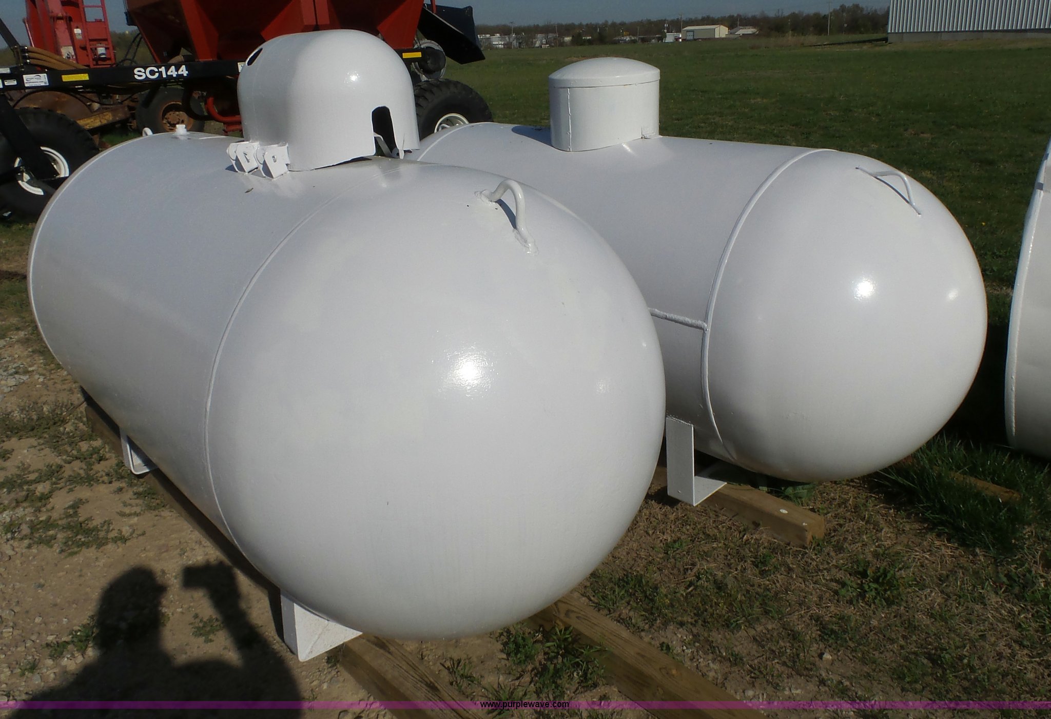 (2) propane tanks in Lamar, MO Item BL9533 sold Purple Wave