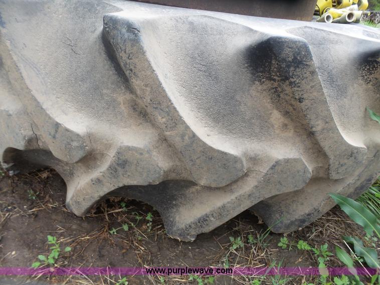 image for item AM9603 (2) Firestone 20.8-38 tires and wheels