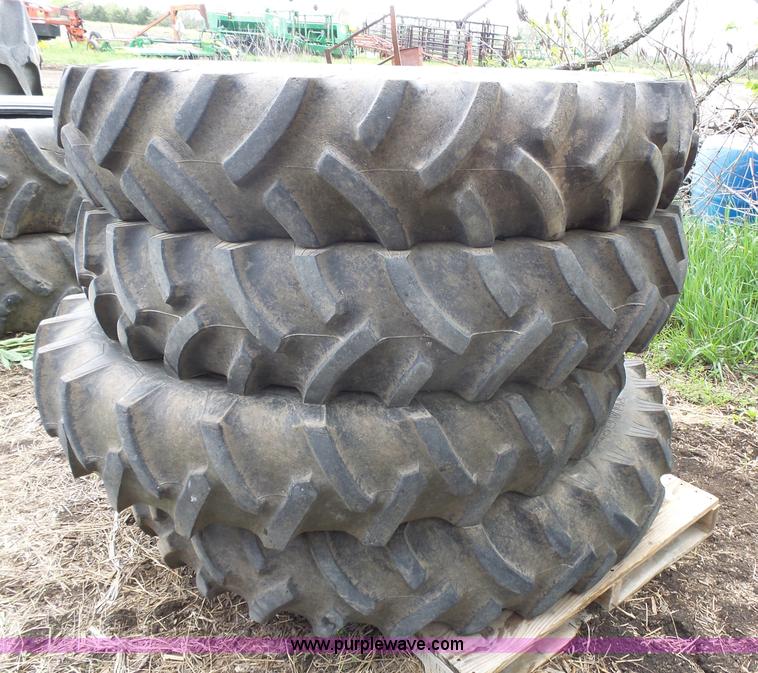 image for item AM9610 (4) Titan 12.4-42 tires and wheels