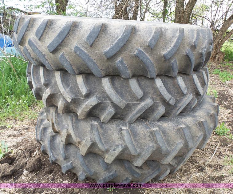 image for item AM9610 (4) Titan 12.4-42 tires and wheels