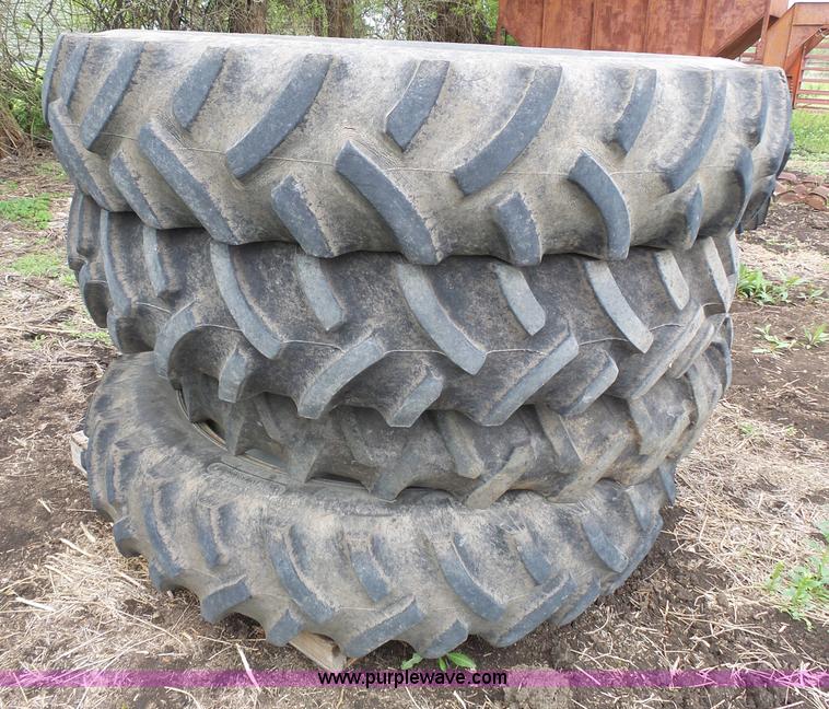 image for item AM9610 (4) Titan 12.4-42 tires and wheels