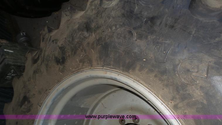 image for item BX9068 (2) 2012 Firestone 30.5x32 tires and wheels