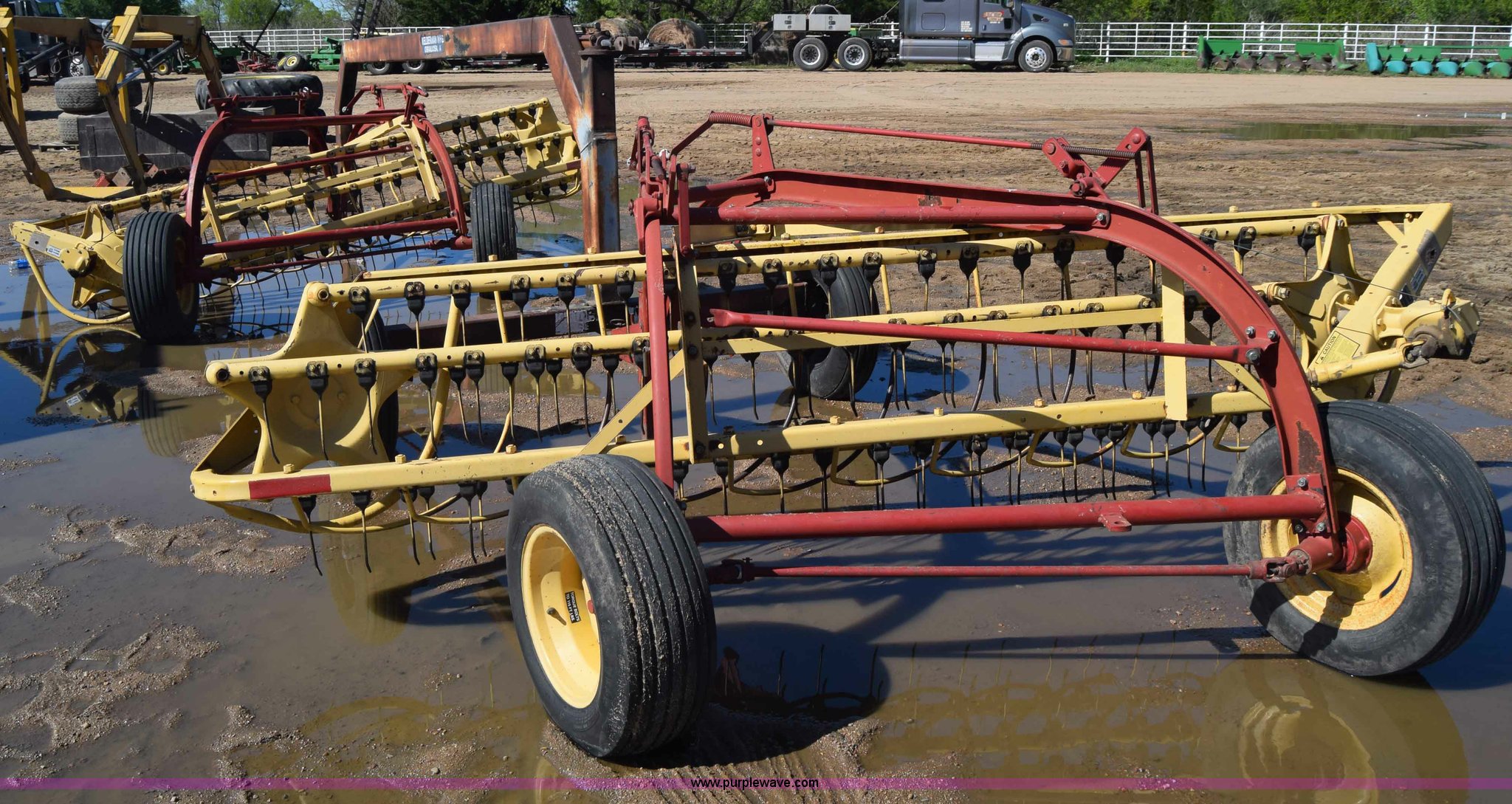 (2) New Holland hay rakes in Kinsley, KS Item AW9790 sold Purple Wave