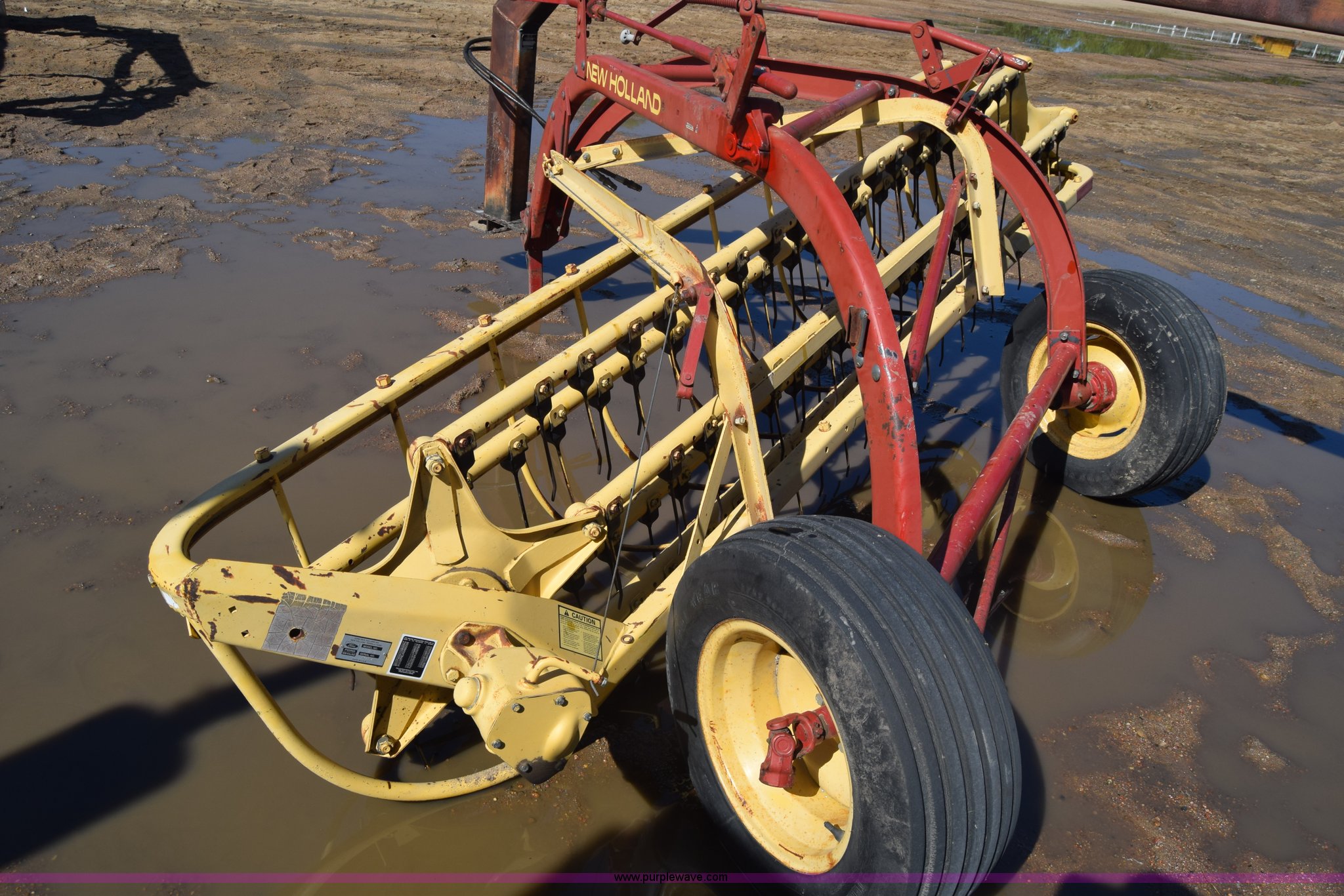 (2) New Holland hay rakes in Kinsley, KS Item AW9790 sold Purple Wave