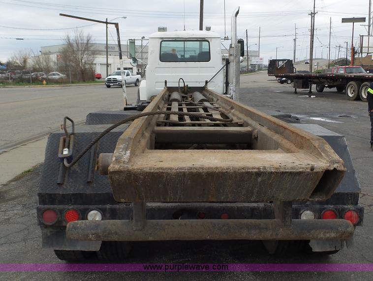 image for item K1339 1997 Mack RD690S roll off truck