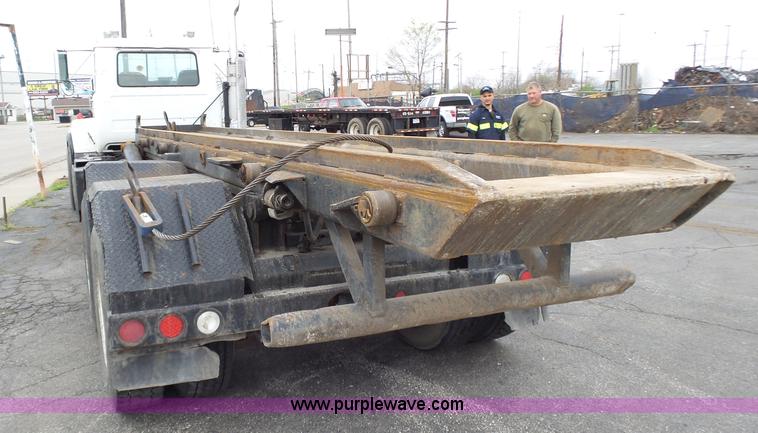 image for item K1339 1997 Mack RD690S roll off truck