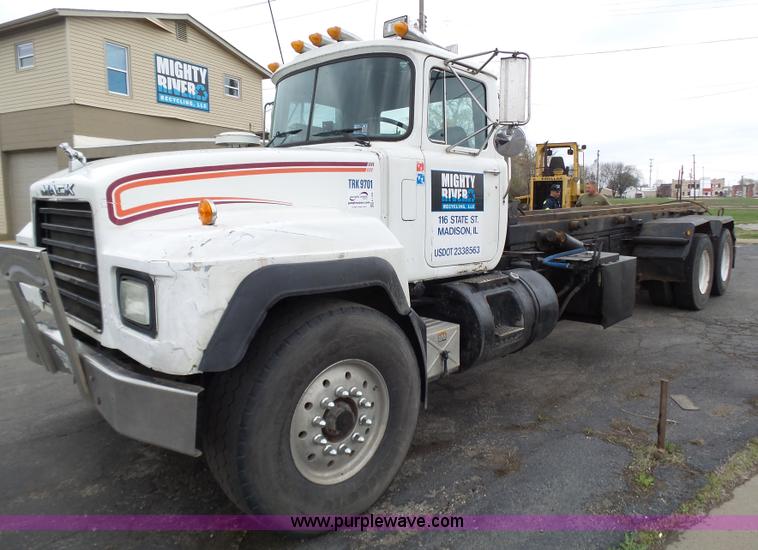 image for item K1339 1997 Mack RD690S roll off truck