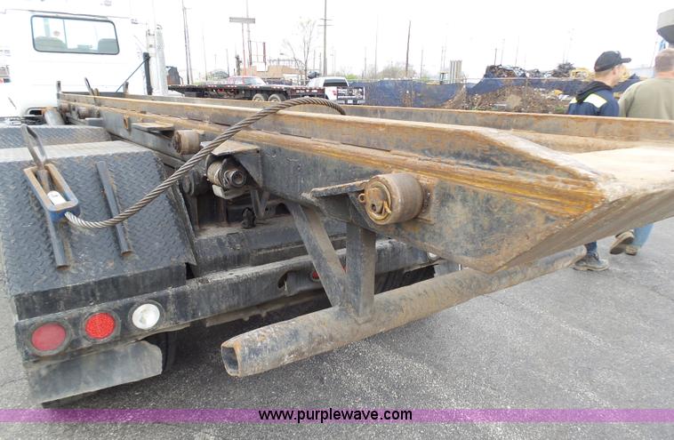 image for item K1339 1997 Mack RD690S roll off truck