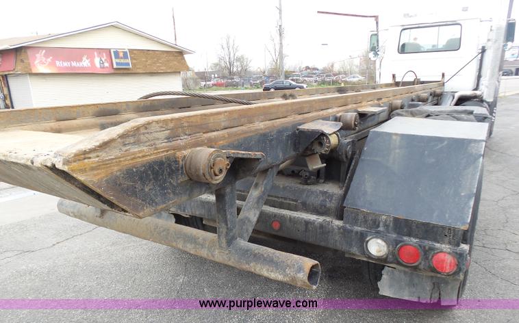 image for item K1339 1997 Mack RD690S roll off truck