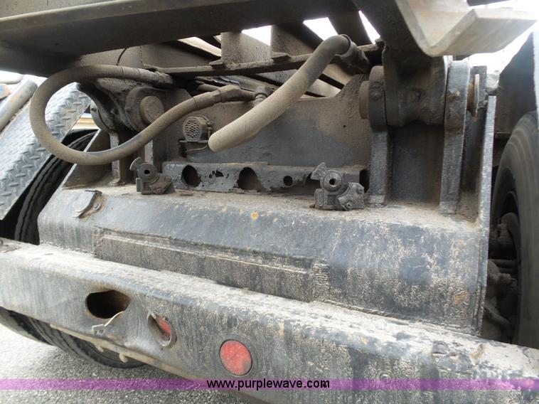 image for item K1339 1997 Mack RD690S roll off truck