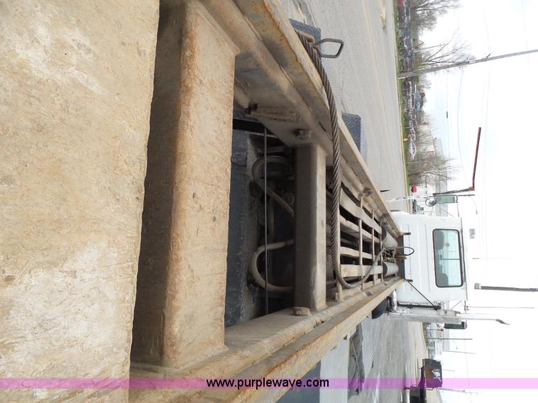 image for item K1339 1997 Mack RD690S roll off truck