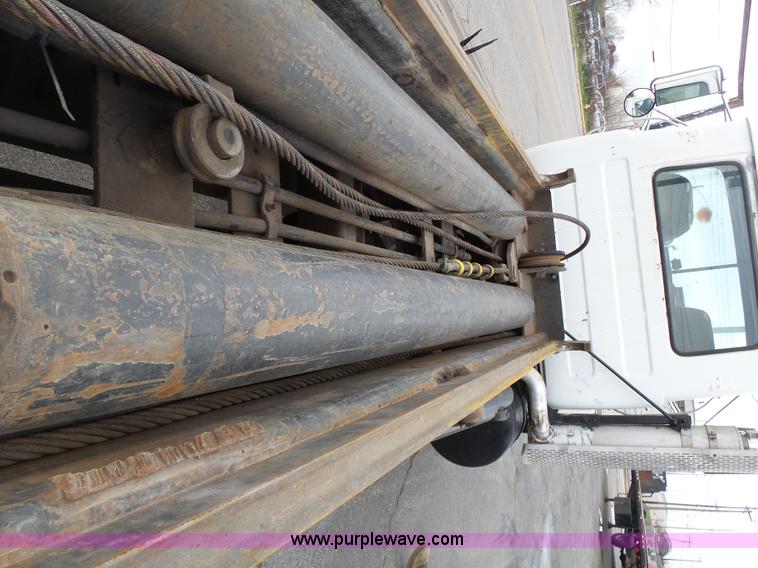 image for item K1339 1997 Mack RD690S roll off truck