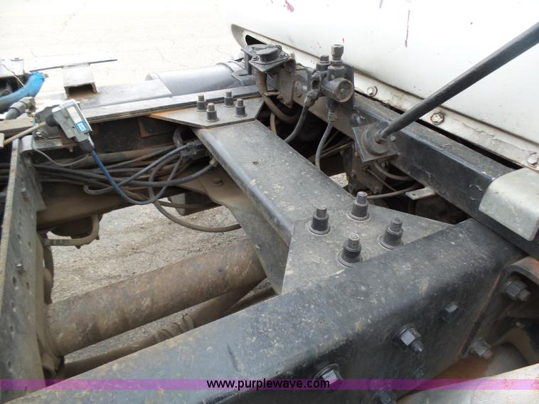 image for item K1339 1997 Mack RD690S roll off truck