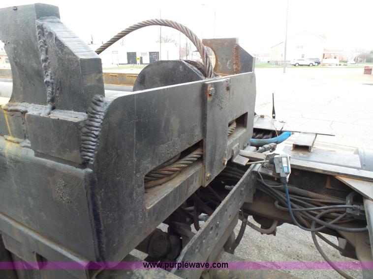 image for item K1339 1997 Mack RD690S roll off truck