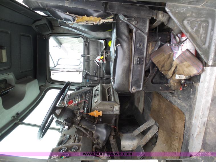 image for item K1339 1997 Mack RD690S roll off truck