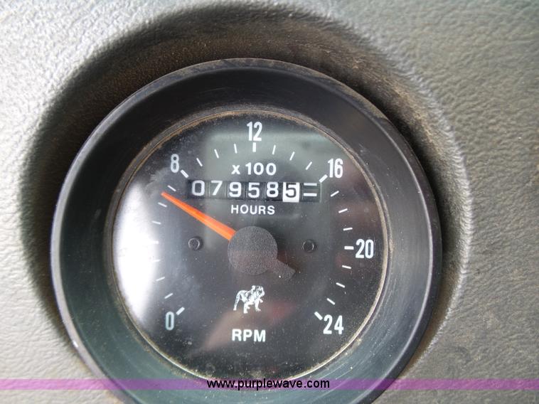 image for item K1339 1997 Mack RD690S roll off truck