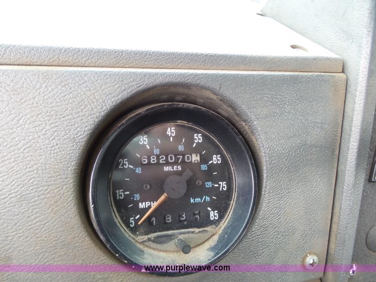 image for item K1339 1997 Mack RD690S roll off truck