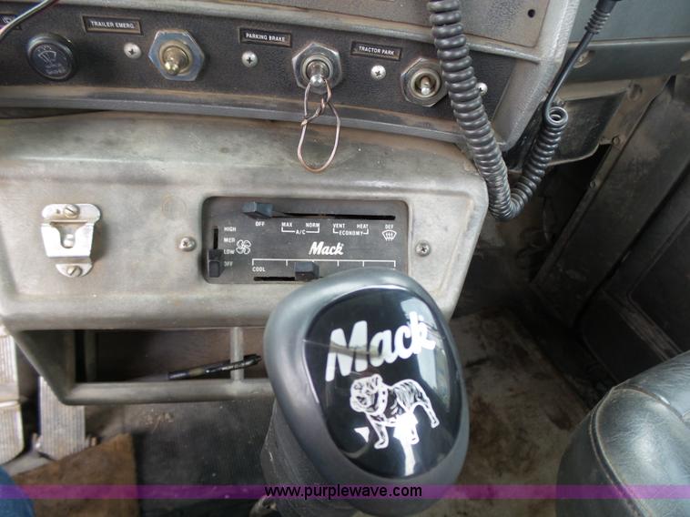 image for item K1339 1997 Mack RD690S roll off truck