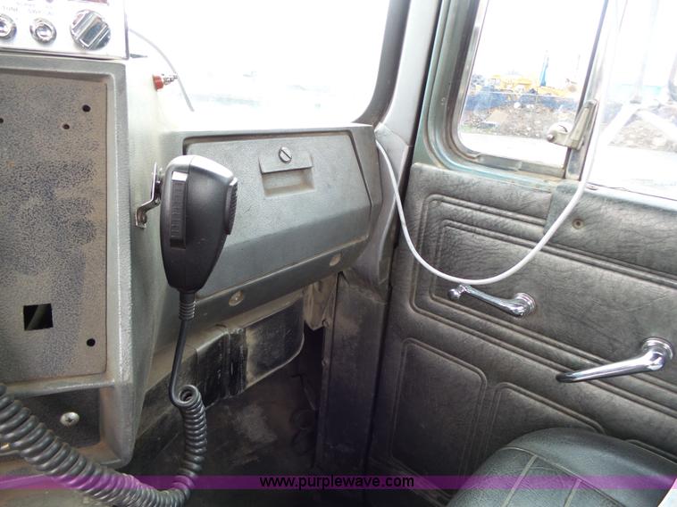 image for item K1339 1997 Mack RD690S roll off truck