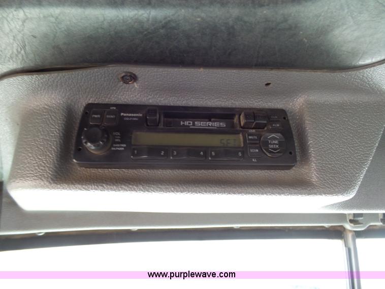 image for item K1339 1997 Mack RD690S roll off truck