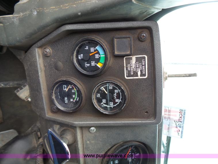 image for item K1339 1997 Mack RD690S roll off truck