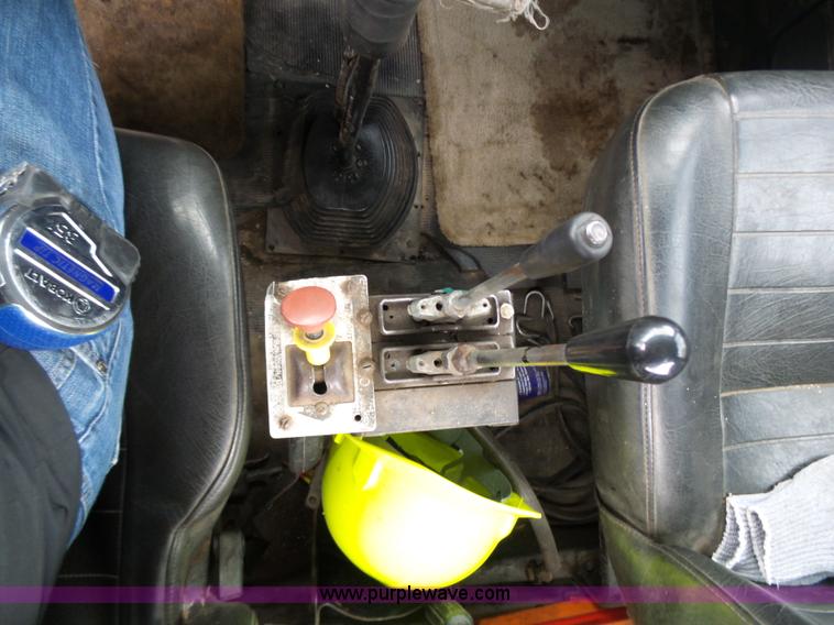 image for item K1339 1997 Mack RD690S roll off truck