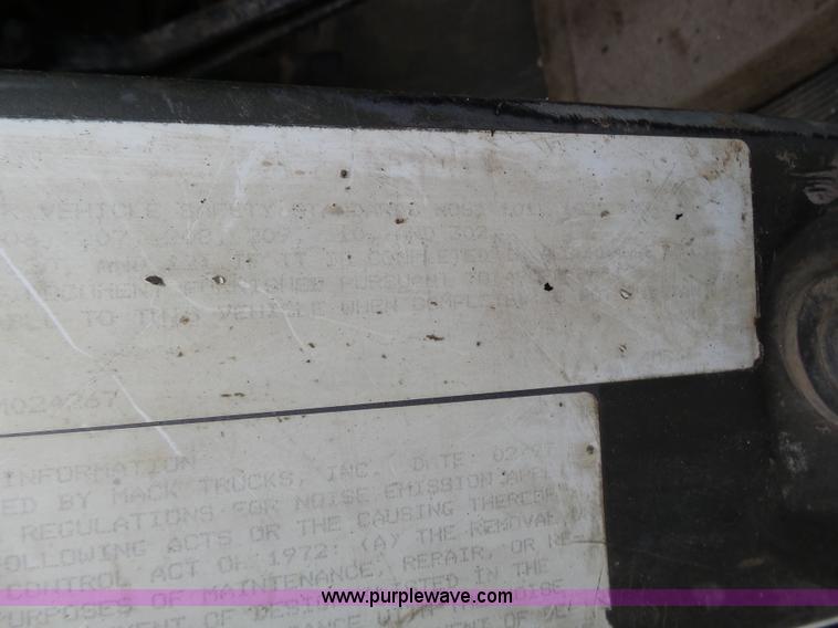 image for item K1339 1997 Mack RD690S roll off truck