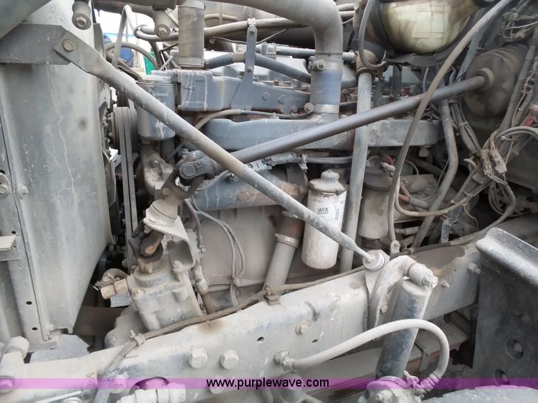 image for item K1339 1997 Mack RD690S roll off truck