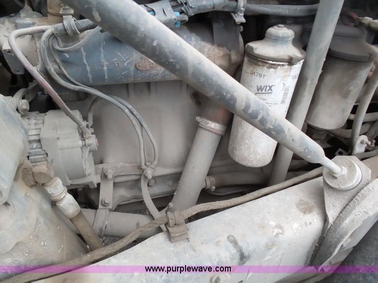 image for item K1339 1997 Mack RD690S roll off truck