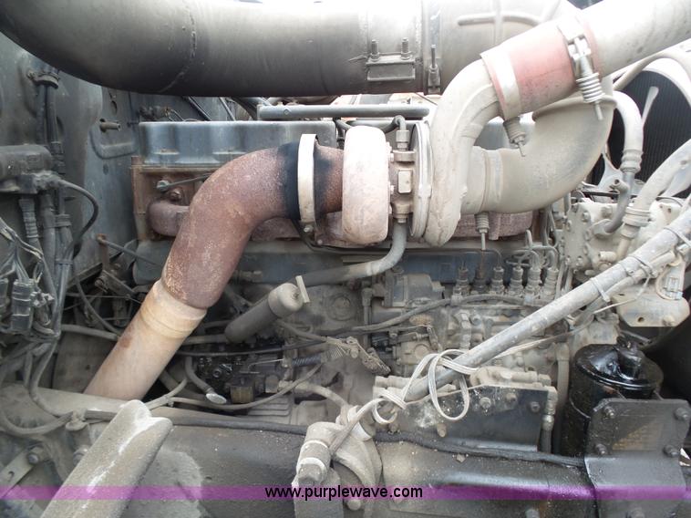 image for item K1339 1997 Mack RD690S roll off truck