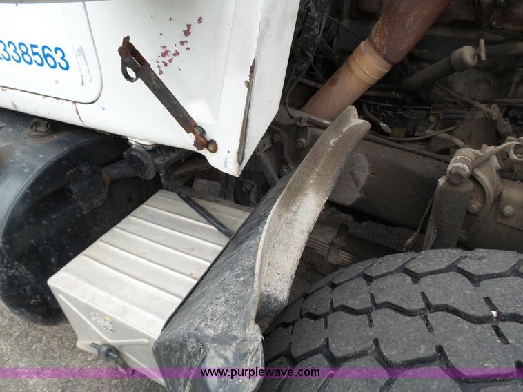 image for item K1339 1997 Mack RD690S roll off truck