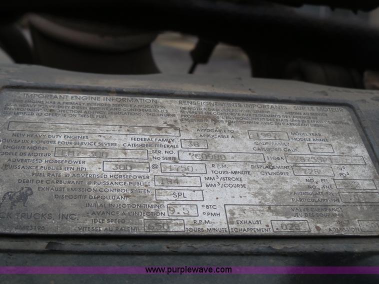 image for item K1339 1997 Mack RD690S roll off truck