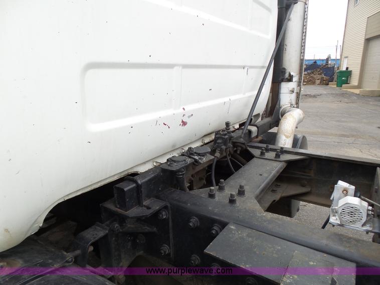 image for item K1339 1997 Mack RD690S roll off truck