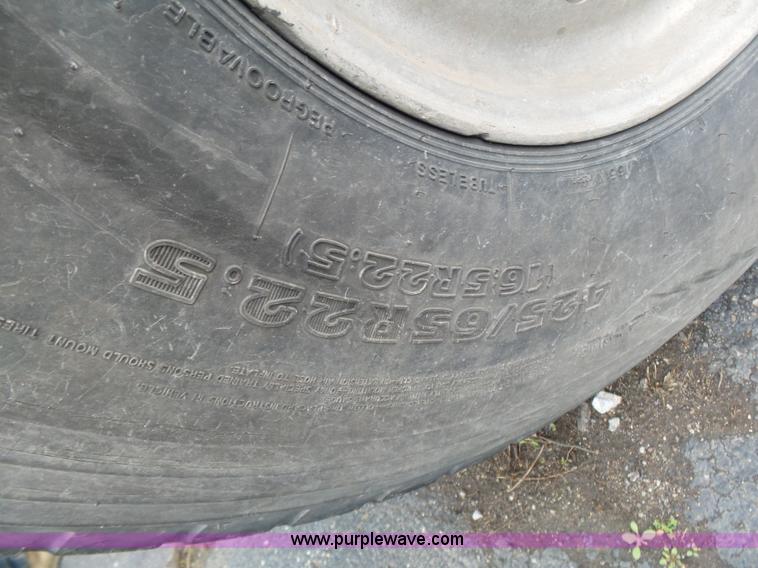 image for item K1339 1997 Mack RD690S roll off truck