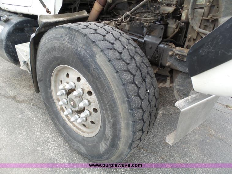 image for item K1339 1997 Mack RD690S roll off truck